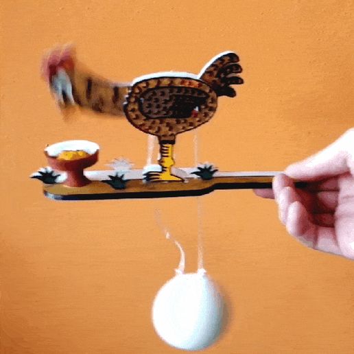 Jouet mecanique GEGE :PICOCO le coq qui picore en marchand