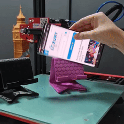 Soporte-de-celular-2.gif STL file Cell phone holder with charging option 2 options・3D printing design to download, LozuryTech