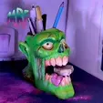 02.gif Zombie head - candy dispenser - pencil holder