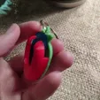 Vídeo-sin-título-‐-Hecho-con-Clipchamp.gif Strawberry guitar pick holder keychain - CHRISTMASXCULTS
