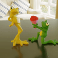 ezgif.com-video-to-gif.gif Two frogs, Pair of frogs, frog kneels, frog with flowers, frog with glass