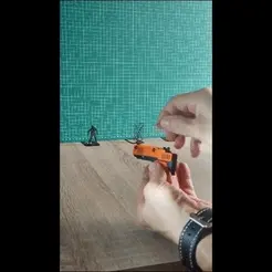GUN.gif 3D file Rubber band gun keychain・3D printable model to download