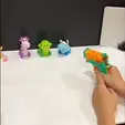 Sequence-03.gif Rubber band mini gun toy