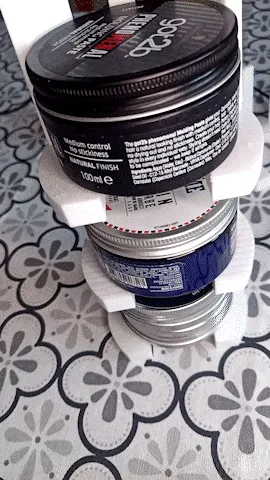 Barber's-rack-showcase.gif Estante para caixas de barbeiro