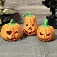 My-Video-pumpkins.gif 3 carved pumpkins
