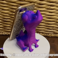 BabyDragonPhoneHolderSpin2.gif Fichier STL gratuit Porte-téléphone bébé dragon・Modèle pour impression 3D à télécharger