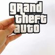 copy_27BBB353-E613-4CE7-B0B5-77707D76A94F.gif LOGO GTA