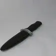 MiseEnFourreau.gif Theatre dagger with retractable blade