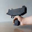 UZI-GIF-1.gif UZI Shell Ejecting Rubber Band Gun Scale 1:1