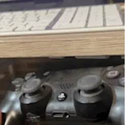 IMG_3958.gif PS4 controller under the desk