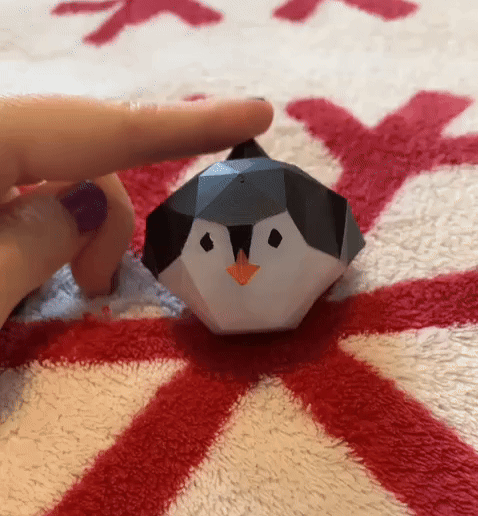 Penguin-gif-1.gif Pengiun sliding low poly