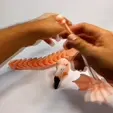 Sequence-01_3.gif ARTICULATED FLAMINGO