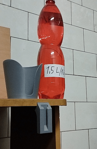 1-example.gif modular cup/mug holder with 5 options for ataching to variouse surfacies