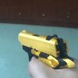 1637427257820230.gif Mini M1911A1 rubberband gun