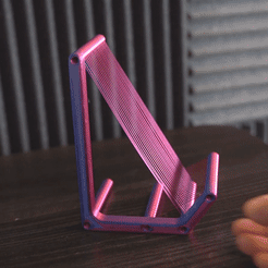 phoneStrandgif.gif Файл STL Экспериментальная подставка для телефона с натяжным мостом・Модель для печати в 3D скачать