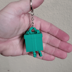 Keyring-Present-GIF.gif STL file Present Keychain With Feet・3D printable model to download, KruegerPrints