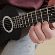 guit1.gif Small travel Guitar playable / Guitarlele