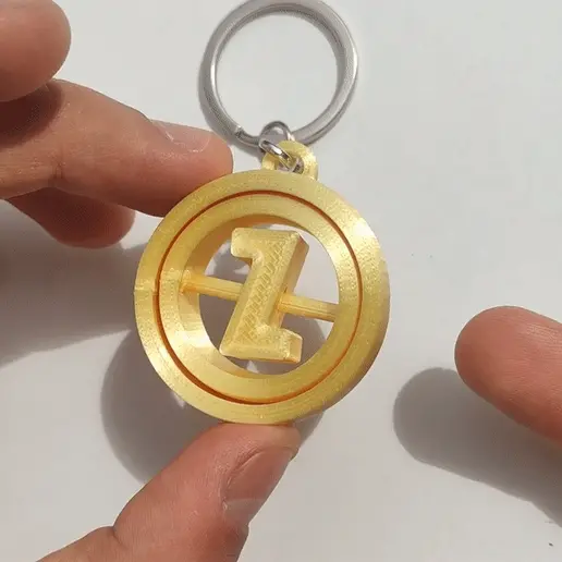 ezgif.com-video-to-gif.gif heart rotating gyroscope keychain
