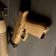 barrel-hanger.gif MAGNETIC HANGER FOR PISTOLS AND REVOLVERS - 9MM AND UP