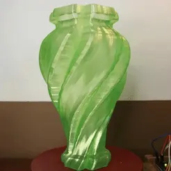 Water-vase_gif-2_10-22.gif Reversible Kinetic Vase!