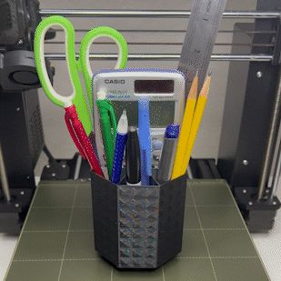 Lapicero.gif Rotating Pen Holder