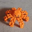 ezgif.com-optimize.gif Osmia Articulated Angry Happy Pumpkin Octopus Spinning Fidget Toy
