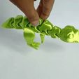 gif-flexi-dinosaurio-Rex.gif STL file Cute Dinosaur Rex Flexi・Design to download and 3D print