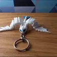 GIFF-2.gif FLEXI PACK - TOOHLESS AND LIGHT FURY KEYCHAINS // HOW TO TRAIN YOUR DRAGON