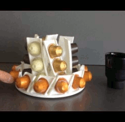 nespresso.gif Présentoir rotatif pour capsules à café Nespresso