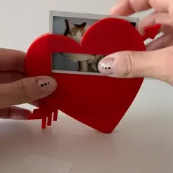 corazongif.gif Heart-shaped photo frame