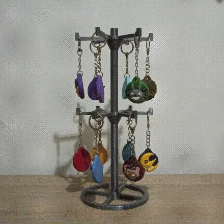 Rotating key ring display stand