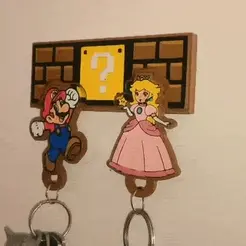 keyring-holder-4.gif Mario and Peach key chains with hanger.