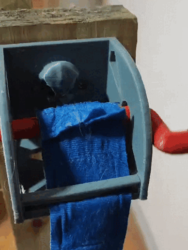WhatsApp-Video-2024-08-28-at-10.21.23-PM.gif Boxing Hand Wrap Roller Machine - Easy Wrapping and Wall-Mountable!