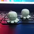 ezgif.com-gif-maker-1.gif CUTE OCTOPUS HAPPY ANGRY SPINNER TOY PLUS KEYRING