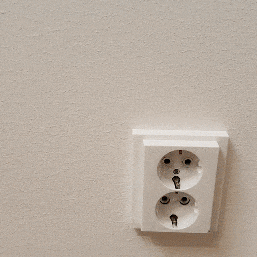 iPhone wall charger holder